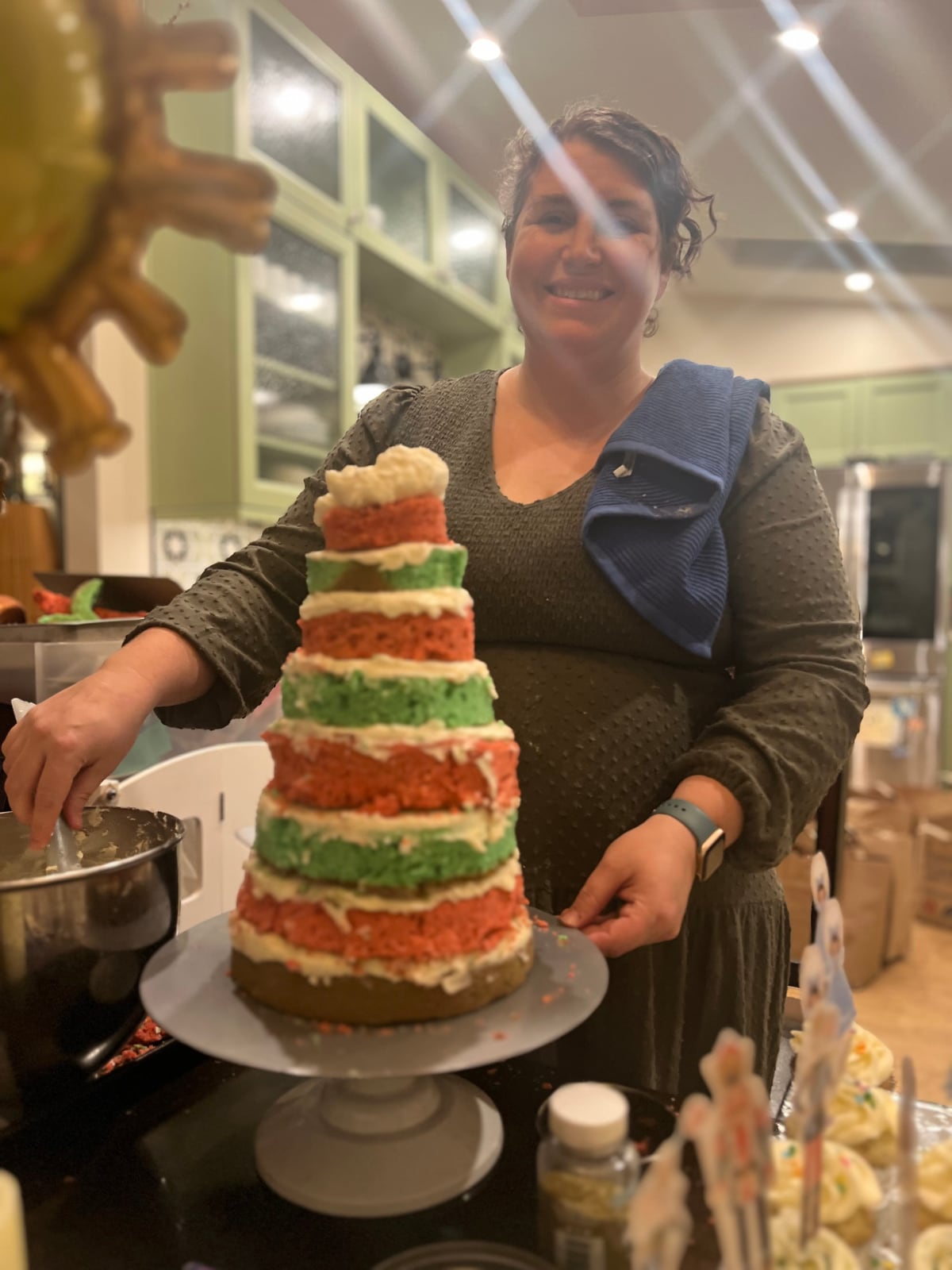 Catherine with a striped tree cake