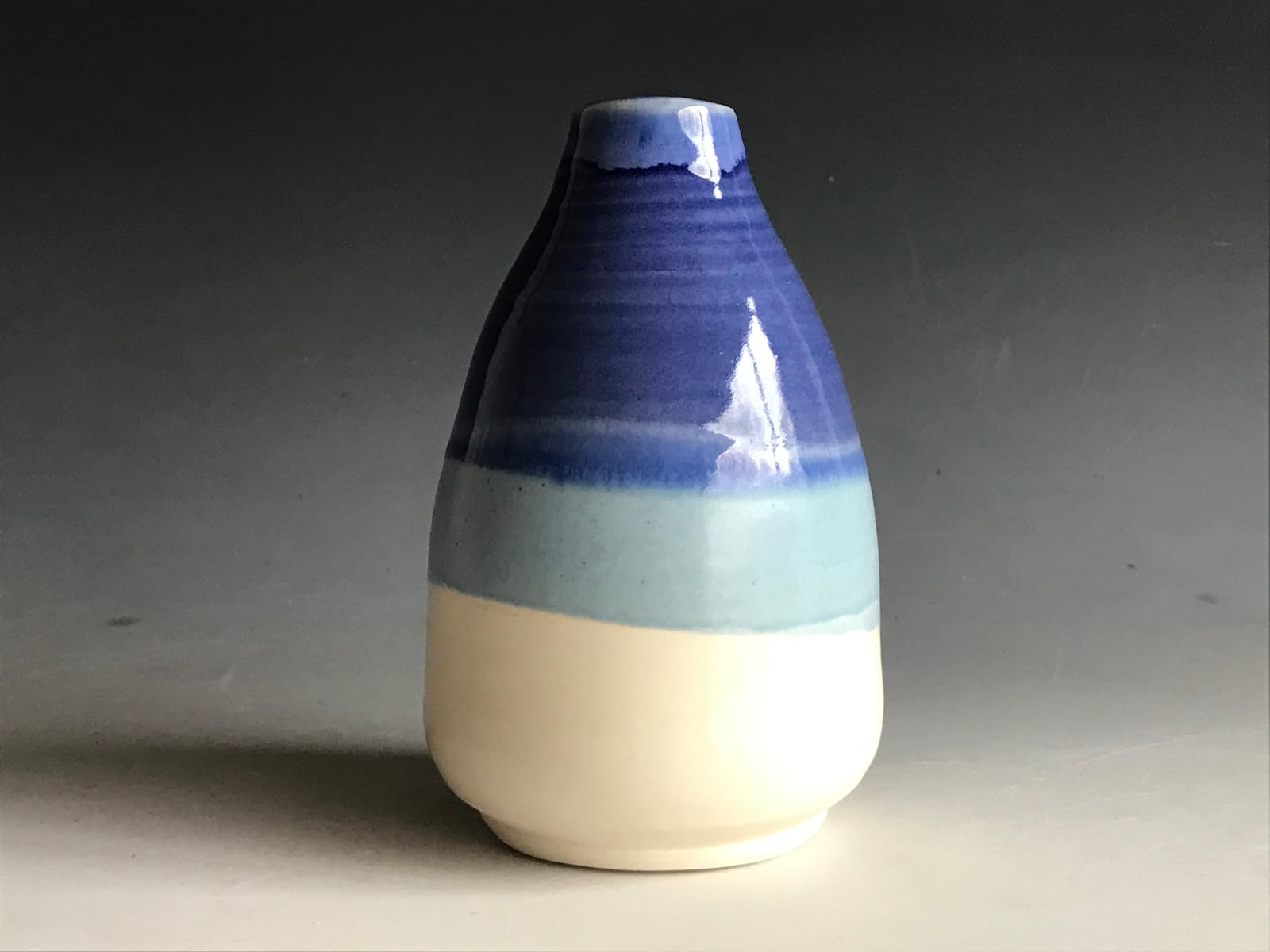 Blue-dipped bud vase