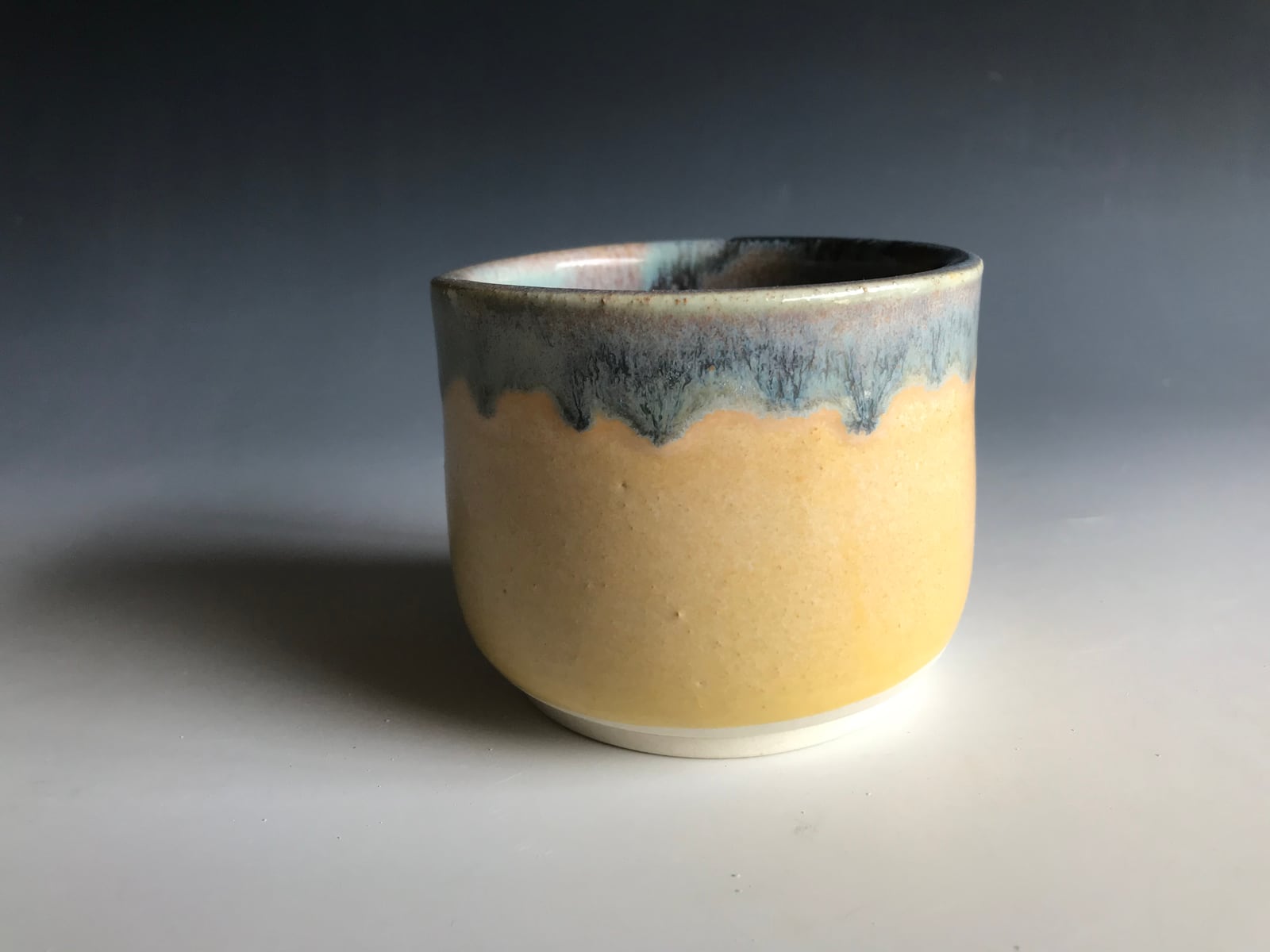 Drippy-rim yellow cup