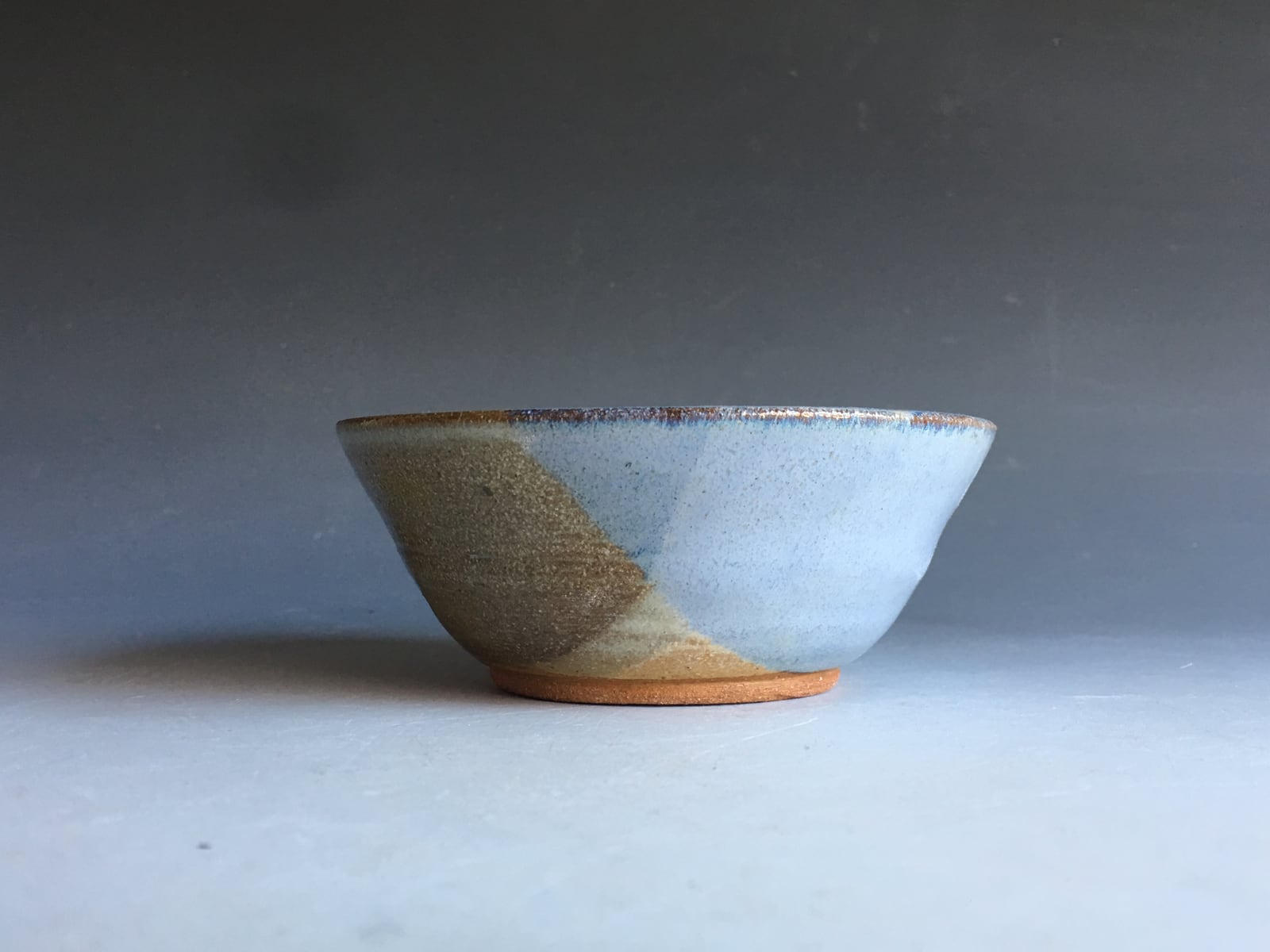 Speckled blue and tan bowl