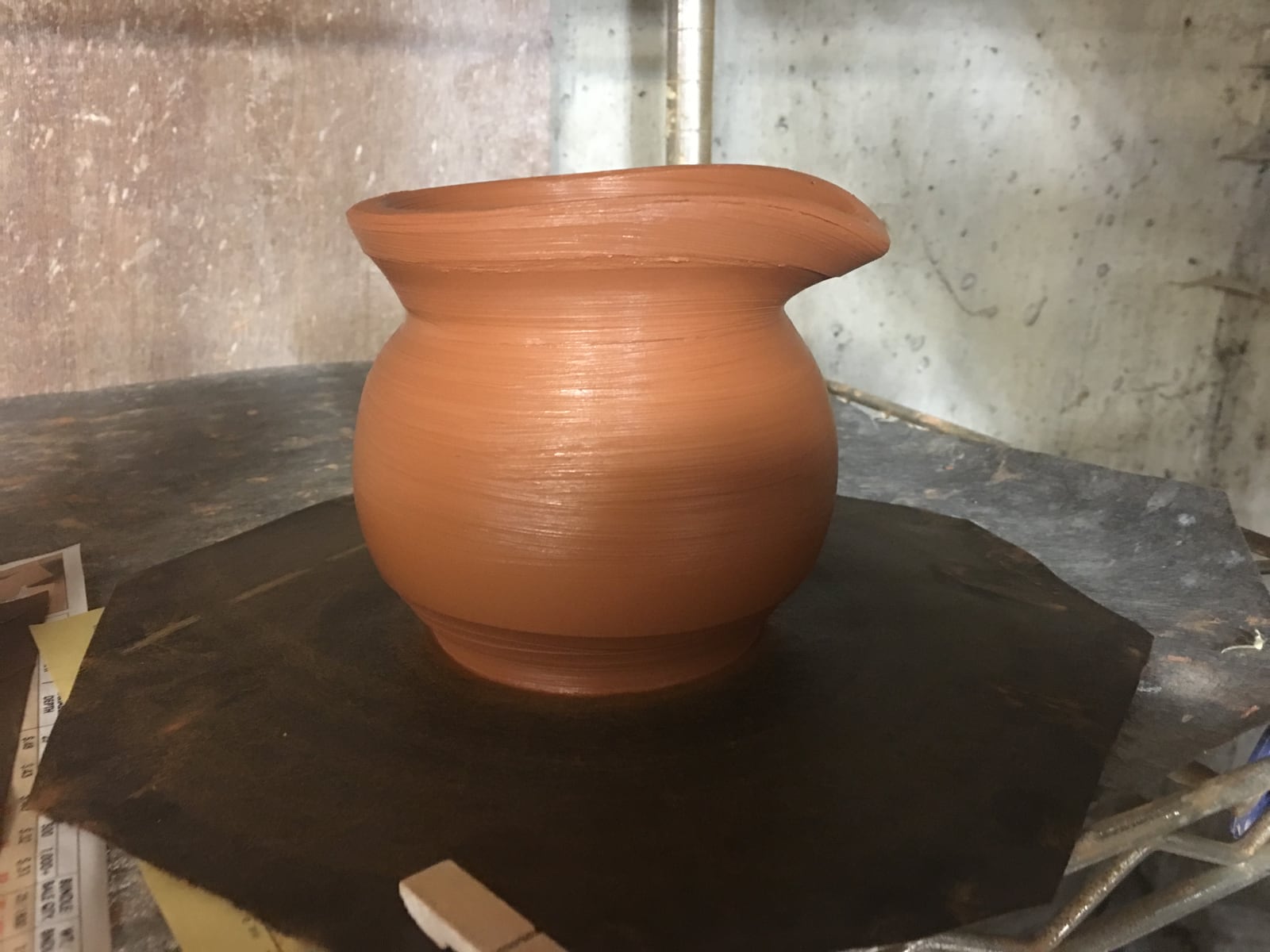 Red clay pitcher, just thrown