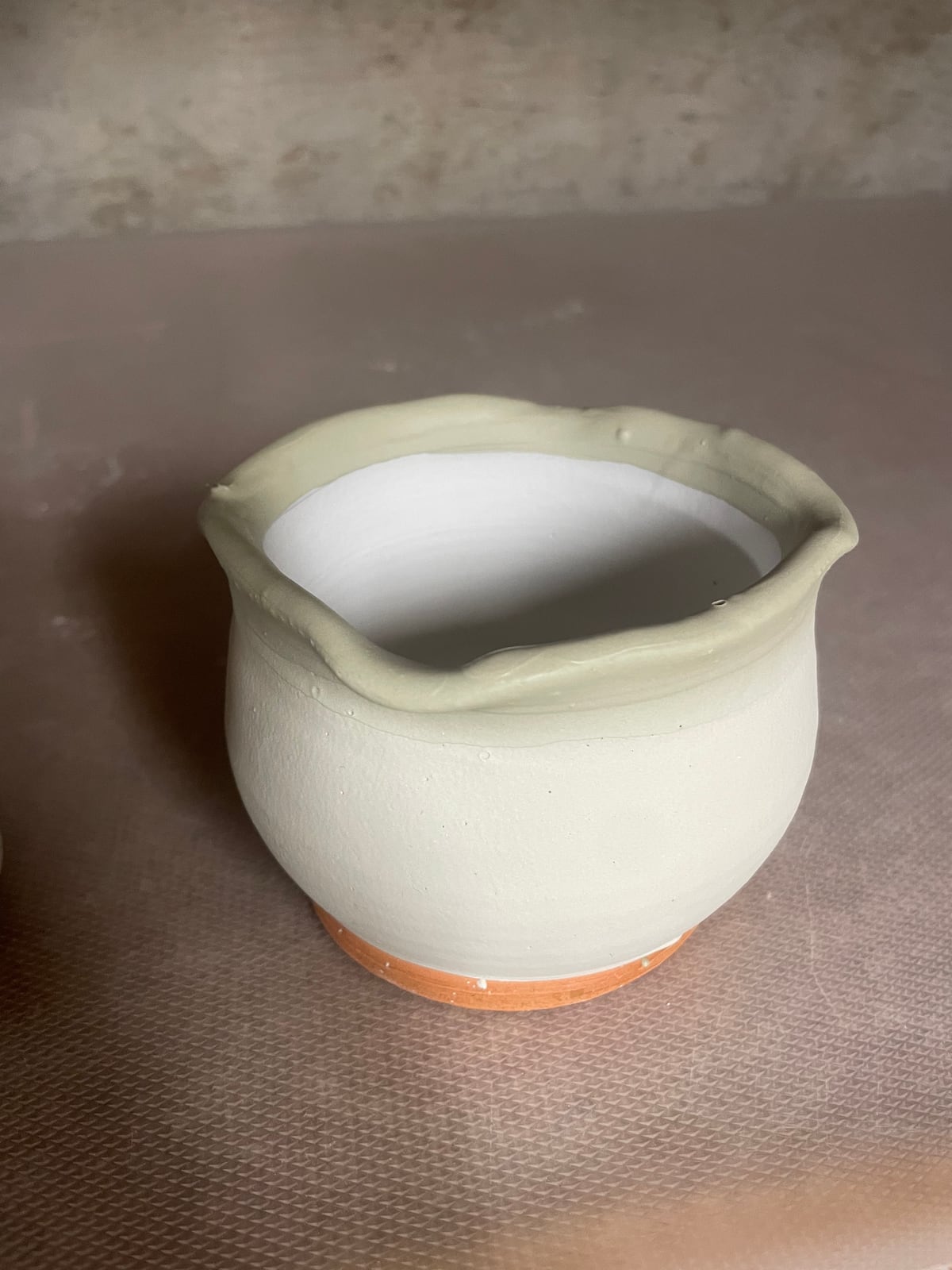 Wavy rim, ready for glaze